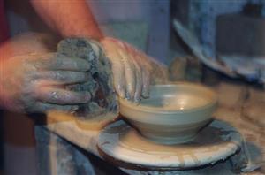 Hands on pottery.