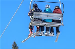 Skiers on Chari Lift